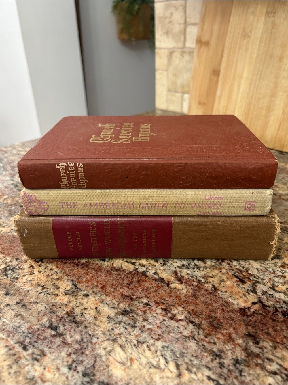 Stack of Vintage Hardcover Books in Brown, Red, and Gray/Cream
